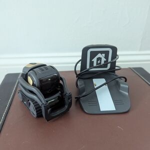 Black and Gold Robot with Charging Dock